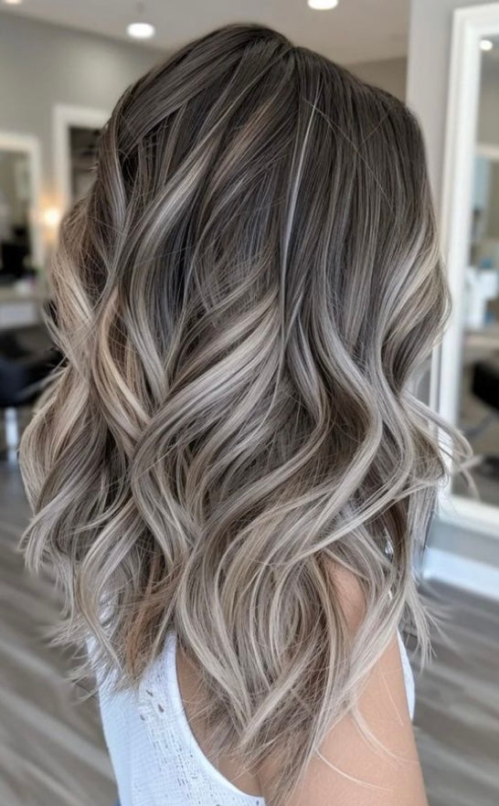 The Luxy- Light brown root melted to light Blonde Highlights