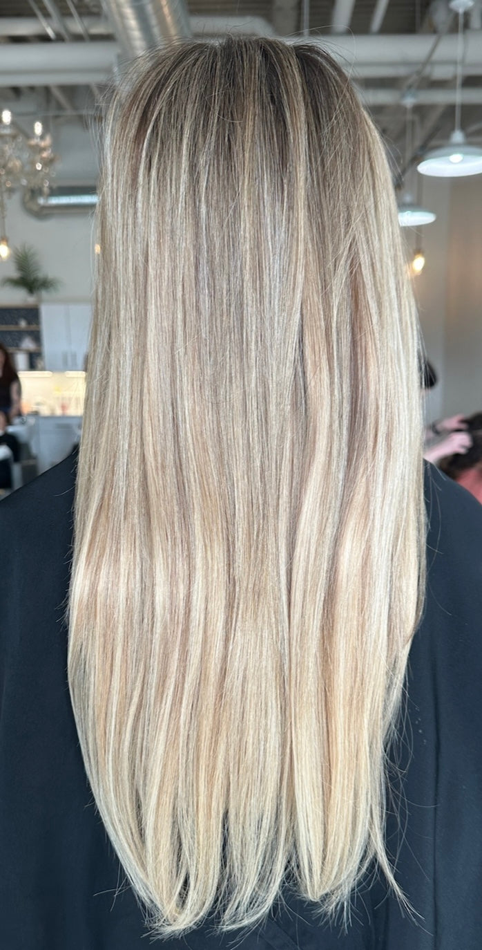 White blonde highlights blended with a neutral lowlight hair extensions